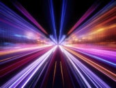 Abstract Speed light trails effect path, fast moving neon futuristic technology background.